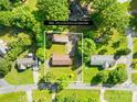 Aerial view shows property lines of a 0.44 acre lot with mature tree coverage at 1408 Delview Rd, Cherryville, NC 28021