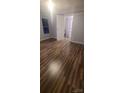 Spacious bedroom featuring wood-look flooring and a bathroom ensuite at 181 Trivette Rd, Harmony, NC 28634