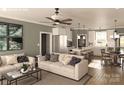 Cozy living room with comfortable seating, stylish decor, and an open layout connecting to the modern kitchen at 1821 Country Club Rd, Wadesboro, NC 28170