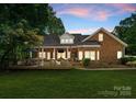 A large, well-maintained deck offers space for outdoor dining and relaxation at 328 Whippoorwill Rd, Mooresville, NC 28117