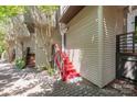 Exterior of home featuring steps with red painted railings to a private entrance at 415 W 7Th St # F, Charlotte, NC 28202