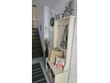 Inviting foyer area with coat rack, bench, and stylish decorative accents at 415 W 7Th St # F, Charlotte, NC 28202