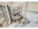 Open-concept living space features a gourmet kitchen, dining area, and fireplace at 715 N Graham St # 603, Charlotte, NC 28202