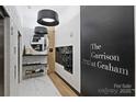 Contemporary lobby with package center, stylish lighting, and sleek finishes at 715 N Graham St # 603, Charlotte, NC 28202
