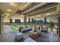Inviting outdoor patio showing skyline views, ample seating, and artificial turf for relaxation and entertainment at 715 N Graham St # 603, Charlotte, NC 28202