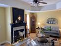 Cozy living room with a fireplace and an elegant decor, featuring an inviting seating area at 2339 Wednesbury Ct, Kannapolis, NC 28083