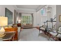 Open living space with hardwood floors, high ceilings, and an abundance of natural light at 3524 Rhett Butler Pl, Charlotte, NC 28270