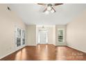 Bright living room boasts hardwood floors, neutral walls, and views of the front yard at 9430 Duckhorn Dr, Charlotte, NC 28277