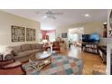 Spacious living room with hardwood floors, stylish furnishings, and ample natural light at 1061 Nw 14Th Avenue Nw Dr, Hickory, NC 28601