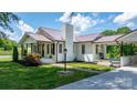 Exterior of a charming home, showcasing the lush lawn and well-kept landscaping at 1300 Nc 90 W Hwy, Taylorsville, NC 28681