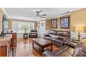 Comfortable living room featuring hardwood floors, ample seating, and natural light at 314 Euclid Ave, Statesville, NC 28677