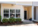 Charming home with a front porch, neat landscaping, and a cozy feel at 112 St Vincent Pl, Mount Holly, NC 28120