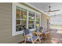 Cozy rocking chairs on the porch with stylish decor creating a relaxing outdoor living space with scenic views at 1241 Rollins Ave, Charlotte, NC 28205