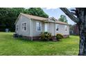 Well-maintained home featuring gray siding and a green lawn in a lovely neighborhood at 2336 32Nd Ne St, Hickory, NC 28601
