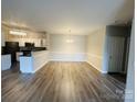Spacious living area with wood floors and natural light at 10673 Hill Point Ct, Charlotte, NC 28262