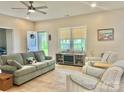 Bright and airy living room with comfortable seating, neutral tones, and ample natural light at 132 Swimmers Ln, Salisbury, NC 28146