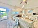 Comfortable living room features neutral paint, light wood floors, and cozy seating arrangement at 132 Swimmers Ln, Salisbury, NC 28146