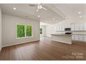 Open-concept living area with sleek hardwood floors, a ceiling fan, and lots of natural light at 1510 Doran Ter, Richburg, SC 29729