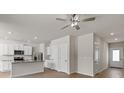 Bright, open-concept kitchen with stainless steel appliances and granite countertops at 1512 Doran Ter, Richburg, SC 29729