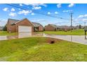 Beautiful single-story brick house with well-kept lawn and driveway in a quiet neighborhood at 4336 Hunter Rhyne Rd # 9, Lincolnton, NC 28092