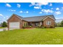 Charming single-story brick home with a well-manicured lawn and a two-car garage at 4336 Hunter Rhyne Rd # 9, Lincolnton, NC 28092