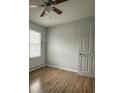 Cozy bedroom with a ceiling fan, window, and modern flooring, ready for comfort at 843 Spring St, Rock Hill, SC 29730