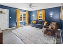 Bright living room featuring stylish decor, windows with natural light, and elegant flooring at 906 Eastwood Dr, Rock Hill, SC 29730