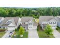 Aerial view of a well-maintained home with a large yard and mature trees at 2104 New Hope Branch Way, Belmont, NC 28012