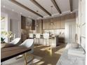 Modern kitchen boasts marble countertops, a stylish island with seating, and sleek cabinetry with wooden accents at 409 Queens Rd # 401, Charlotte, NC 28207