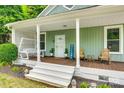 Welcoming front porch featuring wood chairs, a swing, and a cozy atmosphere at 8 Cauthen St, Rock Hill, SC 29730