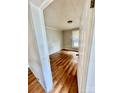 Bright bedroom with natural light, laminate flooring, and a neutral color scheme at 926 Cantwell St, Charlotte, NC 28208
