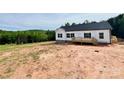 New construction home surrounded by trees and nature at 118 Brett Will Ct, Taylorsville, NC 28681