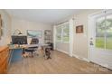 Bright home office features wood floors, a large window, and a comfortable workspace at 127 Leonidas St, Fort Mill, SC 29715