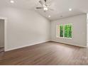 Bedroom with a vaulted ceiling, light walls and wooden flooring at 1503 Doran Ter, Richburg, SC 29729