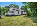 Exterior of a home with lots of potential, ready for renovation and personalization to your tastes at 514 S Martin St, Shelby, NC 28150