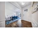 Elegant entryway with hardwood floors and a view of the dining area at 5366 Meadowcroft Way, Fort Mill, SC 29708