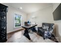 Well-lit home office with a decorative desk and comfortable seating at 5366 Meadowcroft Way, Fort Mill, SC 29708
