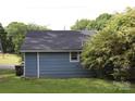View of the back exterior of the home, showcasing its simple design and compact footprint at 614 Goldsboro Ave, Statesville, NC 28677