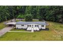 Aerial view of home with carport and fenced in backyard at 12382 Ritchie Rd, Midland, NC 28107