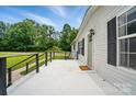 This home offers a spacious, bright deck for outdoor living and enjoyment at 12382 Ritchie Rd, Midland, NC 28107