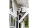 Close-up of the home's exterior lantern lighting and architectural details at 3716 Hamilton Dr, Gastonia, NC 28052