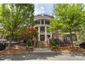 Welcoming building entrance with elegant columns, providing a grand and inviting access for residents and guests at 5425 Closeburn Rd # 208, Charlotte, NC 28210