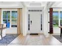 Bright foyer with large window, decorative rug, and a clear view of the front door at 8692 Acadia Pkwy # 591, Sherrills Ford, NC 28673