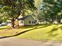 Well-maintained single Gathering home with large front yard and mature shade trees at 312 Shady Ln, Lincolnton, NC 28092