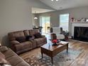 Comfortable living room featuring plush seating and a view of the outdoor patio at 1421 Piney Church Rd, Concord, NC 28025
