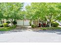 Inviting home with a well-maintained lawn, covered front porch and a two-car garage at 19539 Denae Lynn Dr, Cornelius, NC 28031