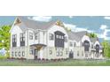 Elegant multi-story home with detailed trim, multiple windows, and landscaped front yard, offering great curb appeal at 305 S Gardner Ave, Charlotte, NC 28208