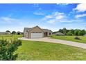 Lovely one-story home with an attached garage and large driveway nestled on a spacious lot at 3645 Kimber Ln, Sherrills Ford, NC 28673
