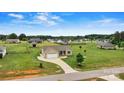 Charming single-story home features a two-car garage, well-maintained lawn, and an inviting driveway at 3645 Kimber Ln, Sherrills Ford, NC 28673