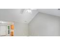 Bright living room featuring high vaulted ceilings and fresh paint at 6216 Bandy Dr, Charlotte, NC 28227